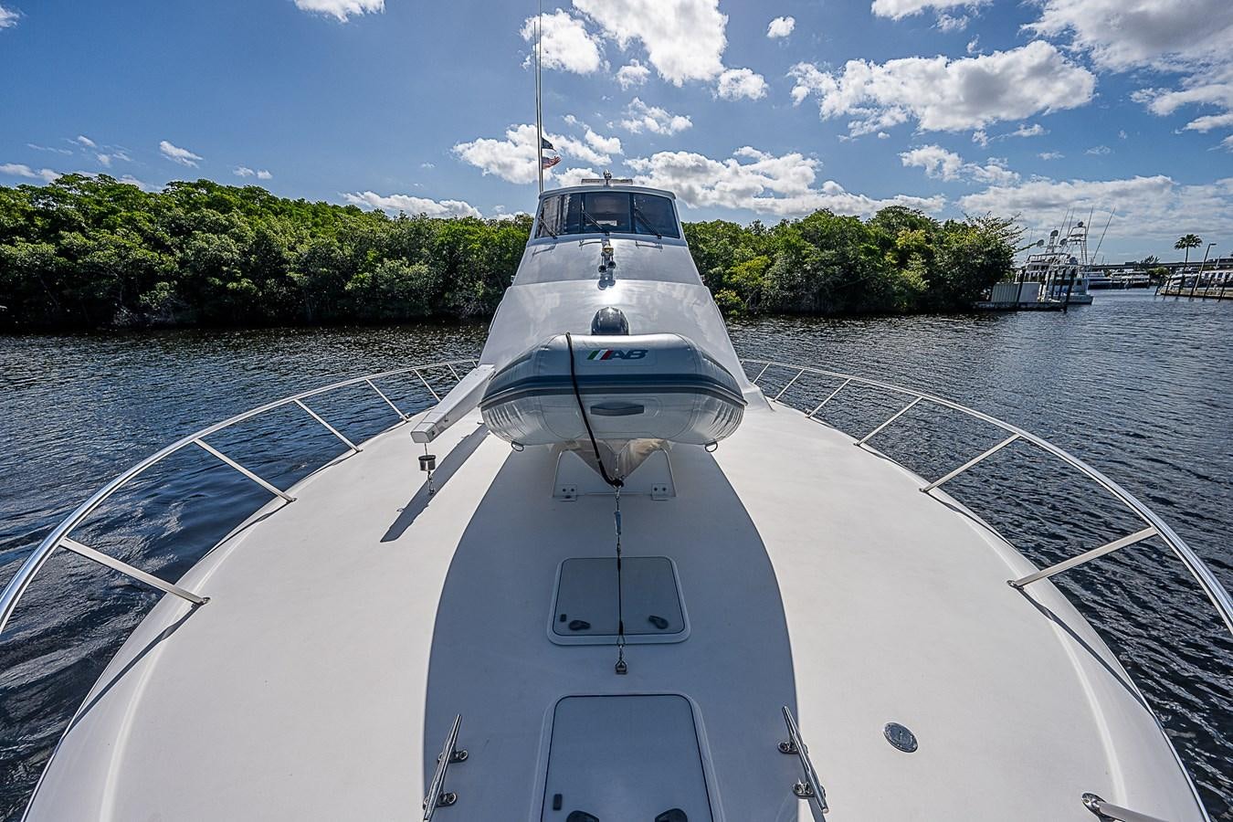 a boat on the water aboard THIS LITTLE PIGGY Yacht for Sale