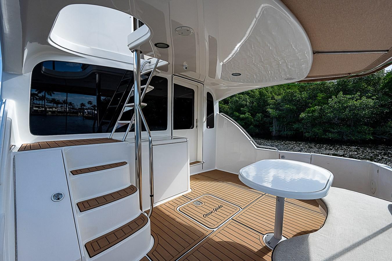 a white tent with a table and chairs outside aboard THIS LITTLE PIGGY Yacht for Sale