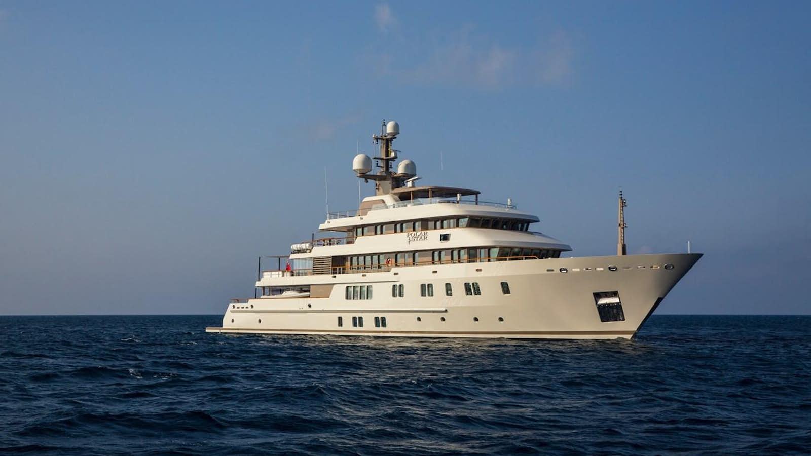 a large white boat in the water aboard POLAR STAR Yacht for Sale
