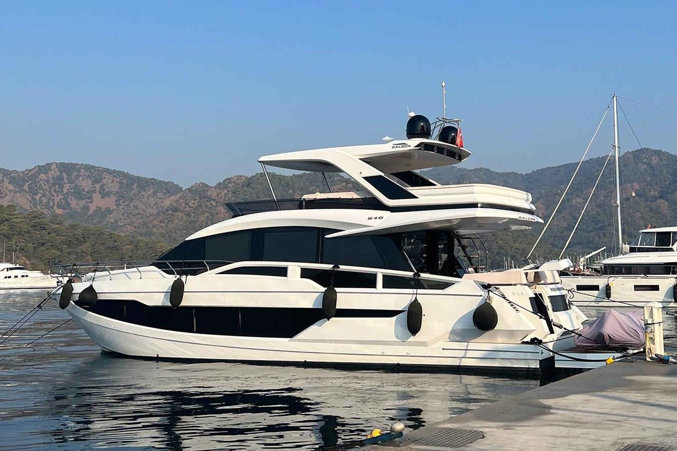 a boat docked at a pier aboard AQUAMARINA Yacht for Sale