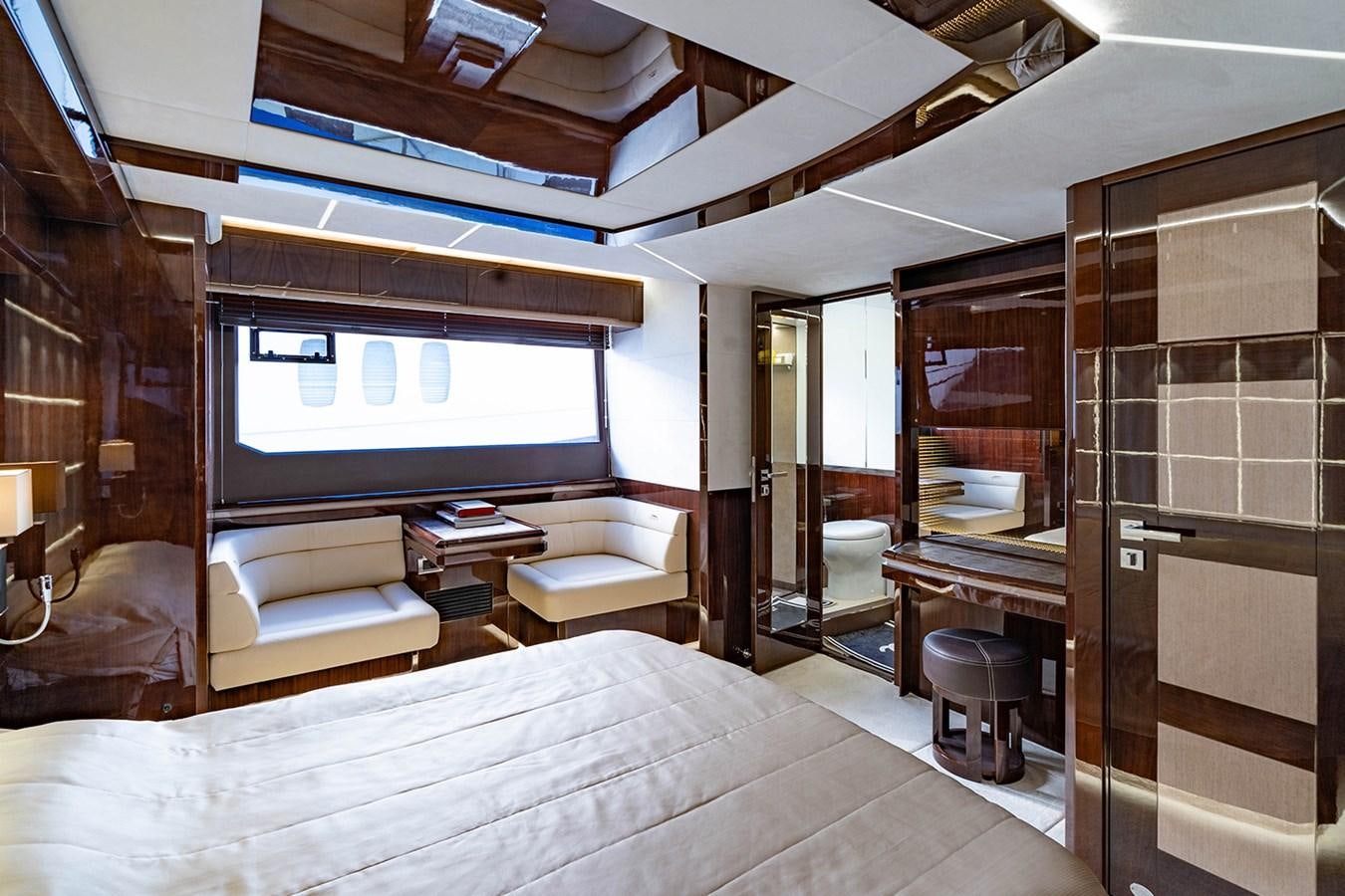 a room with a bed and a tv aboard AQUAMARINA Yacht for Sale