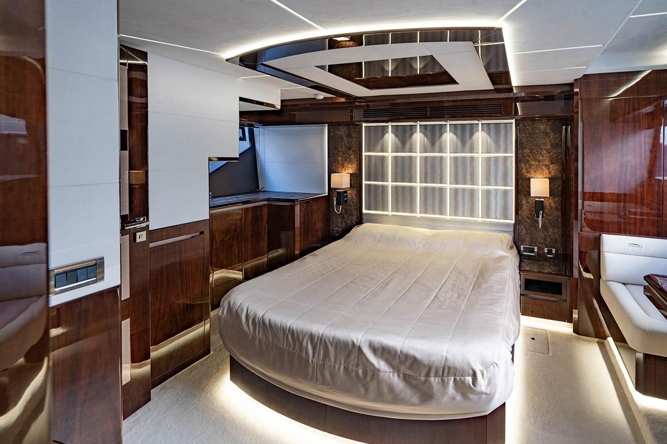 a room with a bed and a window aboard AQUAMARINA Yacht for Sale