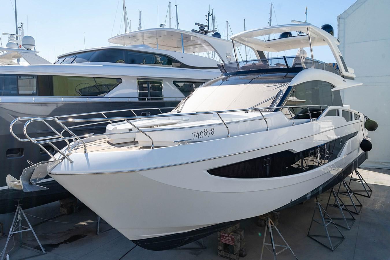 a couple of white yachts aboard AQUAMARINA Yacht for Sale
