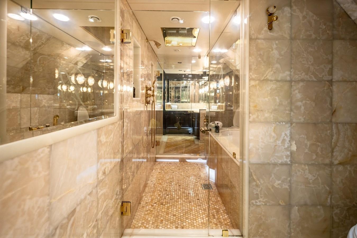a bathroom with a shower and a sink aboard GRADE I Yacht for Charter