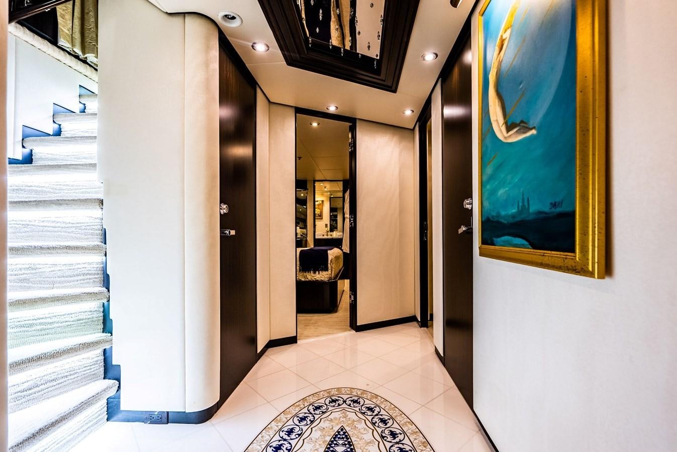 a hallway with a painting aboard GRADE I Yacht for Charter