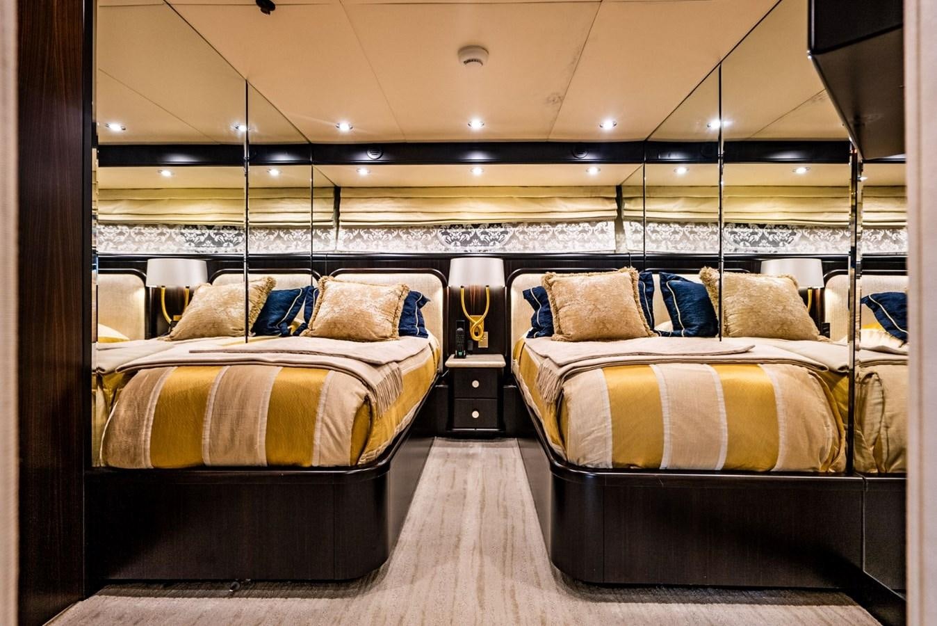 a couple of beds in a room aboard GRADE I Yacht for Charter