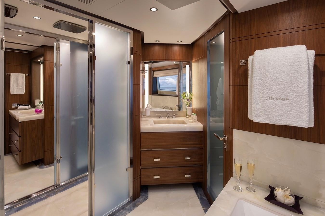a bathroom with a shower unit and sink aboard JODI ANN Yacht for Charter