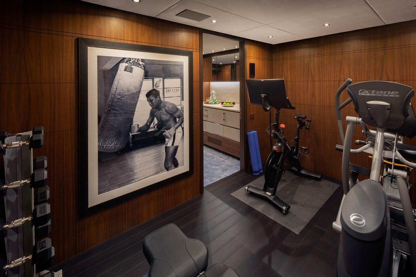 a room with a painting on the wall aboard JODI ANN Yacht for Charter