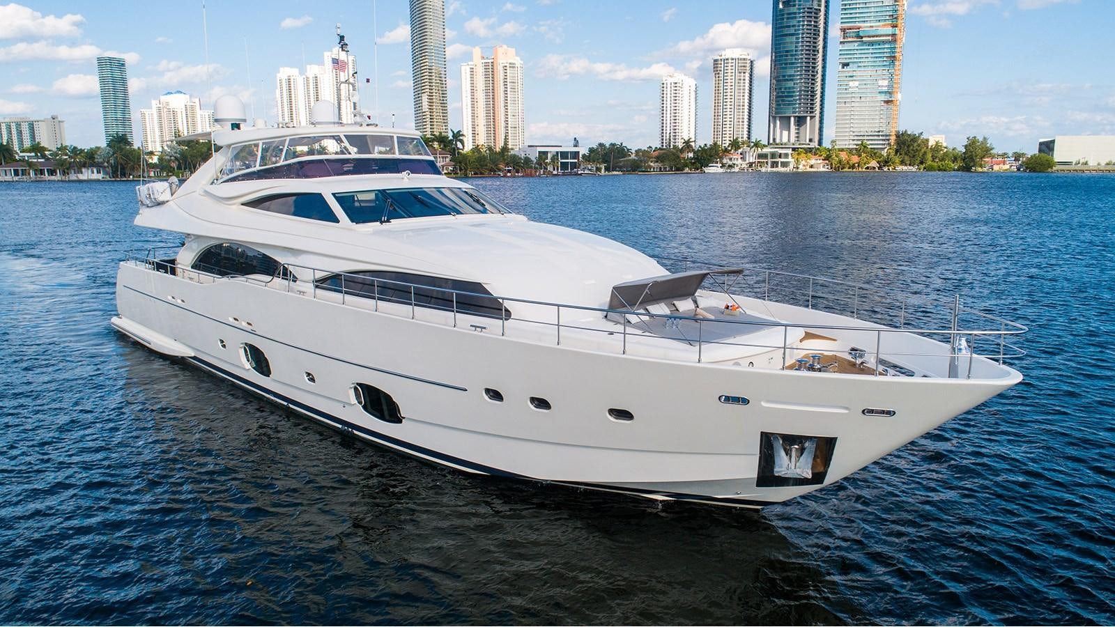 a white yacht on the water aboard PATRON Yacht for Sale