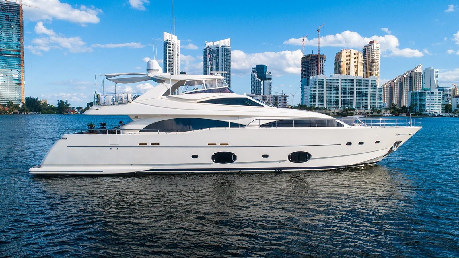 a white yacht in the water aboard PATRON Yacht for Sale