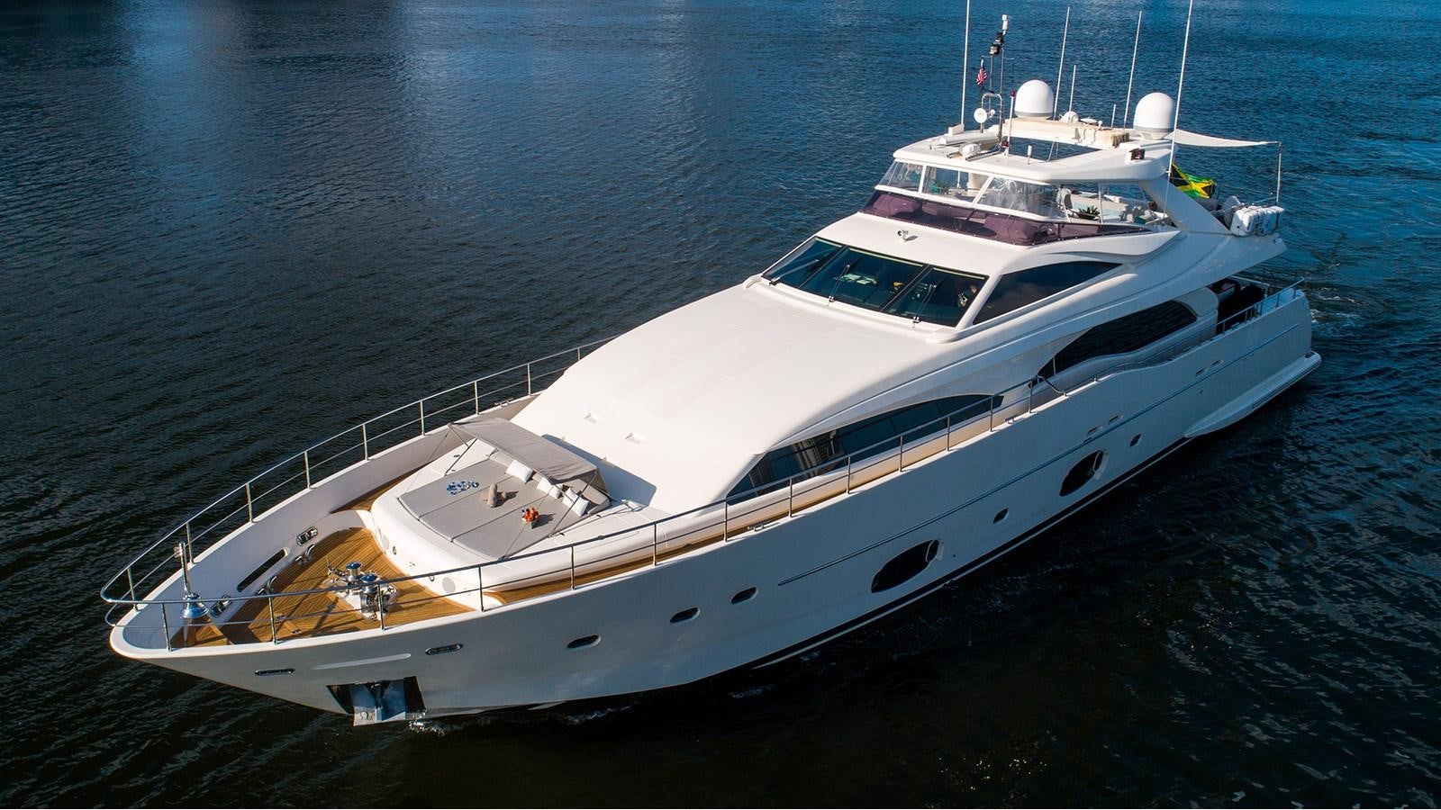 a white yacht on the water aboard PATRON Yacht for Sale