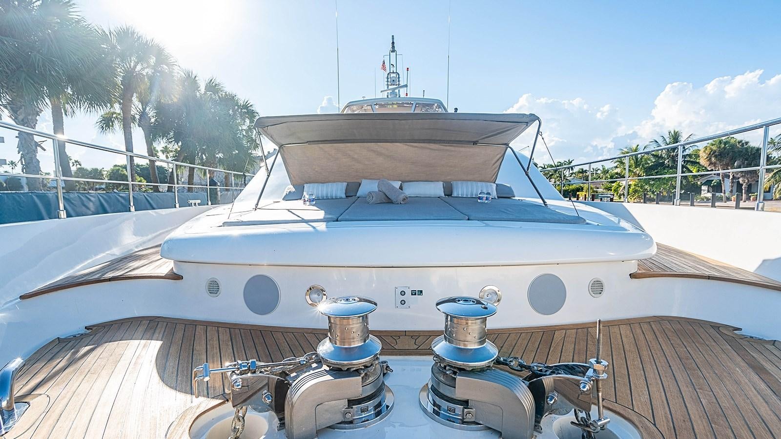 a boat on a dock aboard PATRON Yacht for Sale