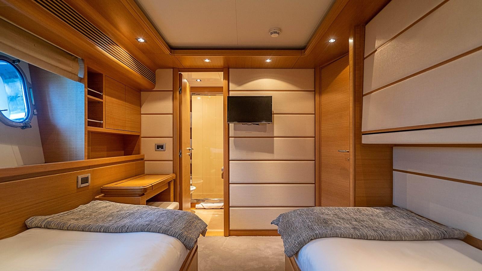 a room with bunk beds aboard PATRON Yacht for Sale