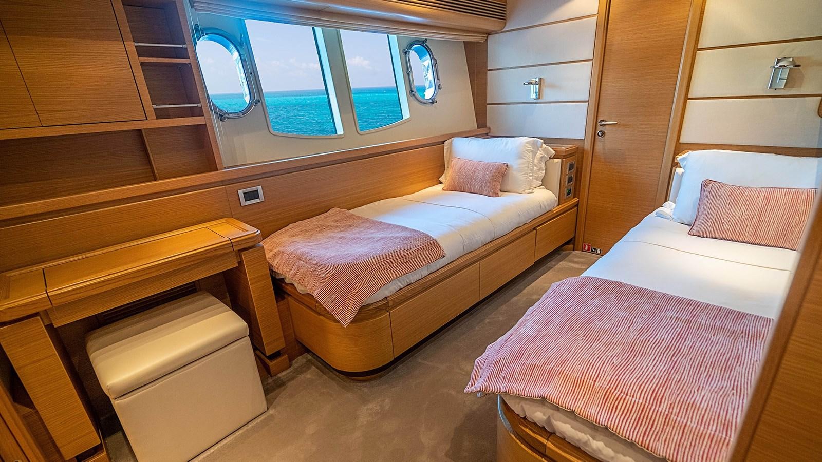 a room with bunk beds aboard PATRON Yacht for Sale