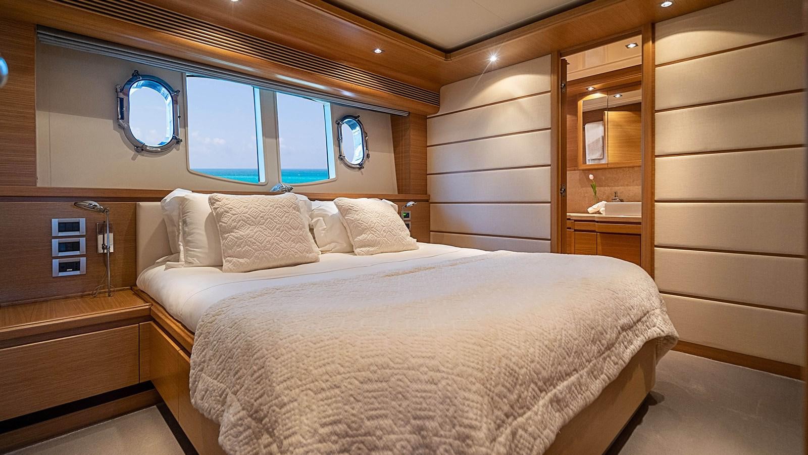 a bed in a cabin aboard PATRON Yacht for Sale