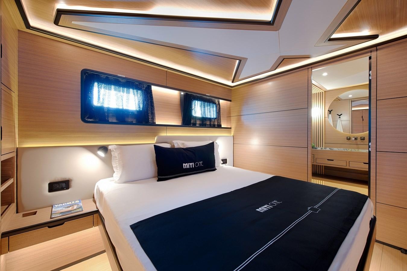 a bed in a room aboard MITI ONE Yacht for Charter