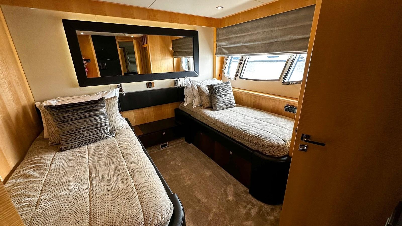 a room with two beds aboard SOFI V Yacht for Sale