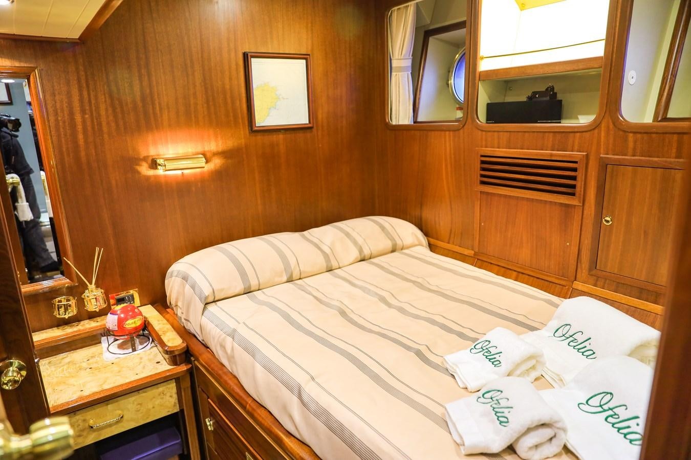 a bed in a cabin aboard OFELIA Yacht for Sale