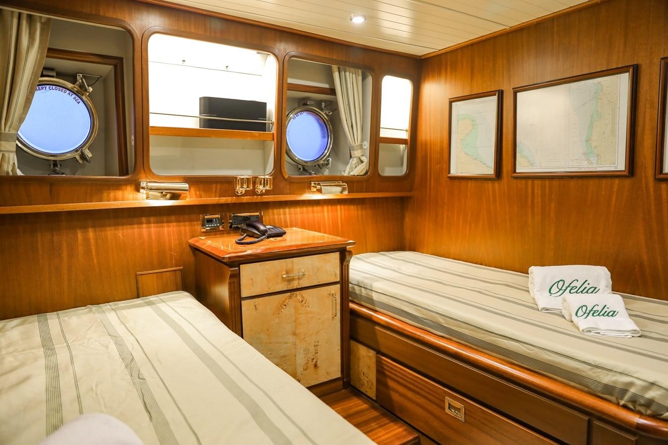 a room with two beds aboard OFELIA Yacht for Sale