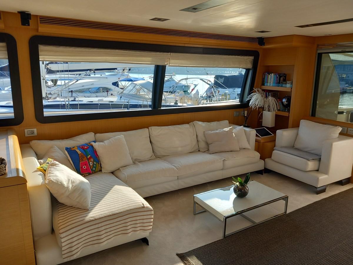 a living room with a large window aboard ALIN Yacht for Sale