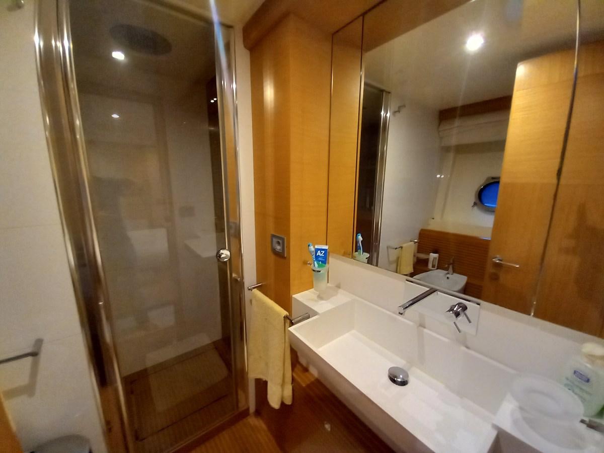 a bathroom with a large mirror aboard ALIN Yacht for Sale