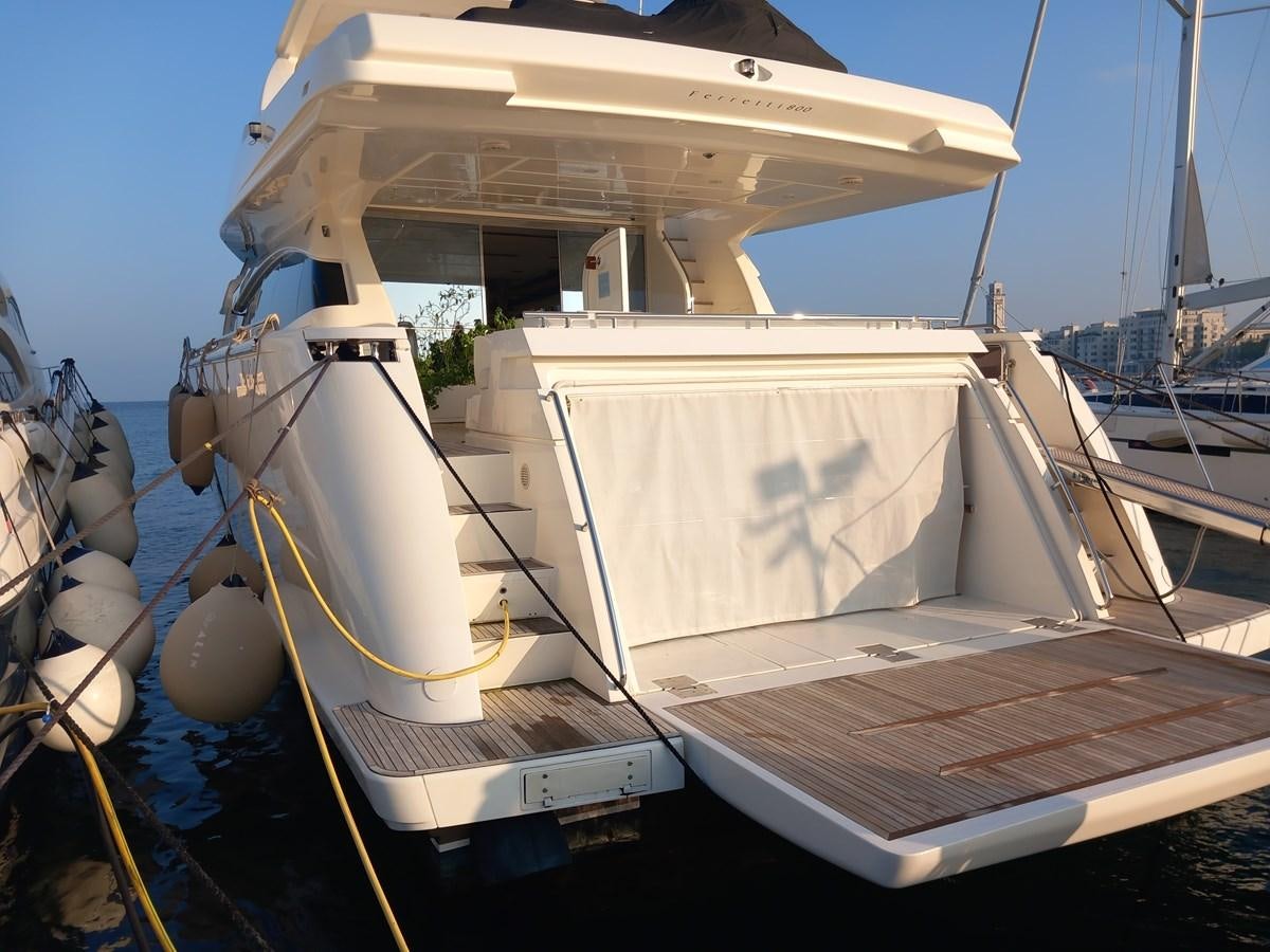 a boat docked at a pier aboard ALIN Yacht for Sale
