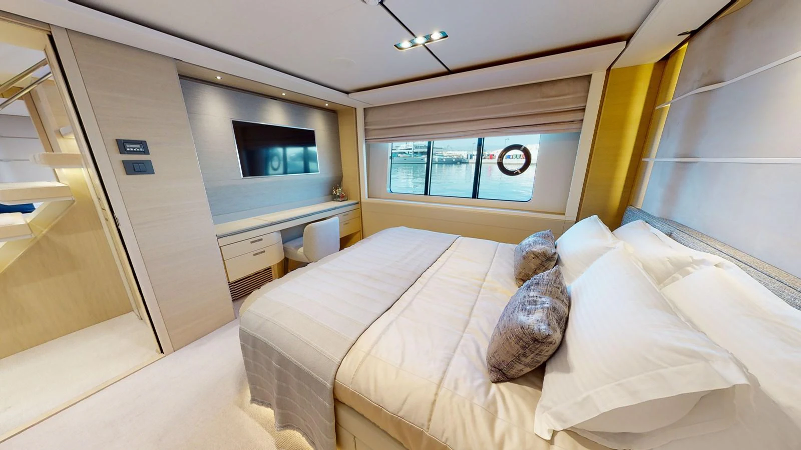 a bed with a pillow on it aboard HALLELUJAH Yacht for Charter