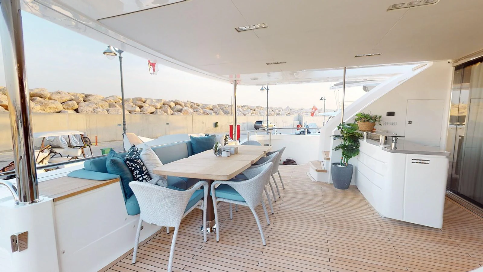 a room with a table and chairs aboard HALLELUJAH Yacht for Charter