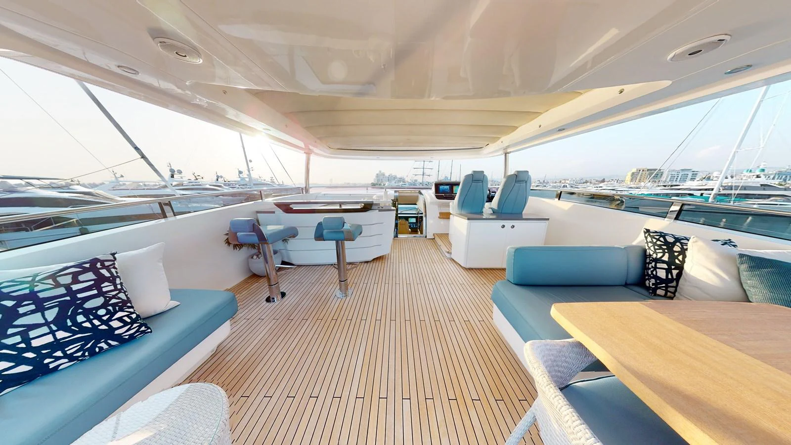 a boat with a deck and chairs aboard HALLELUJAH Yacht for Charter
