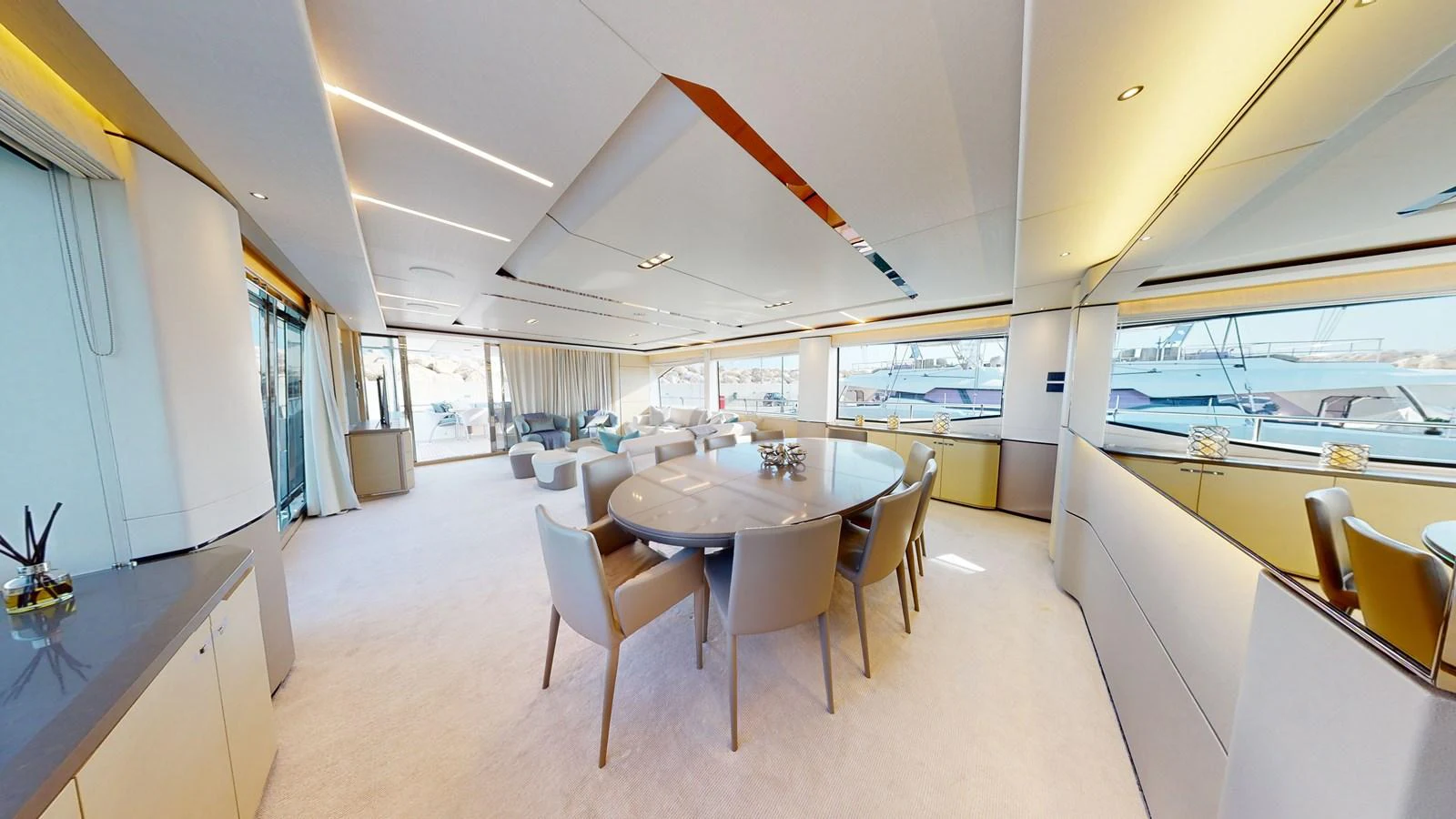 a room with tables and chairs aboard HALLELUJAH Yacht for Charter