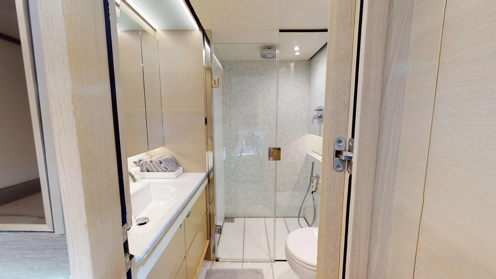 a bathroom with a glass shower aboard HALLELUJAH Yacht for Charter