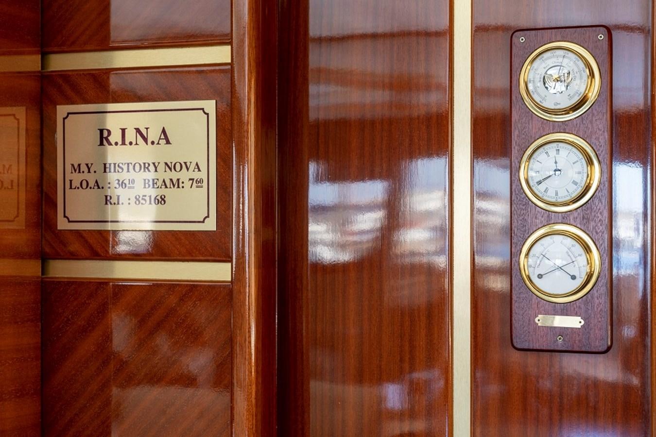 a clock on a wall aboard DENIZ Yacht for Sale