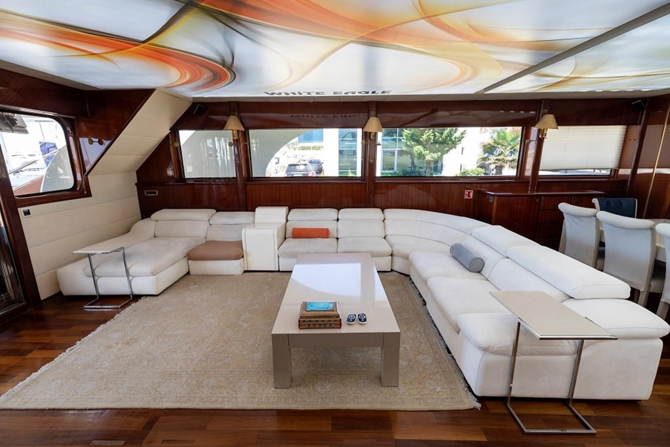 a room with a couch and a table aboard DENIZ Yacht for Sale