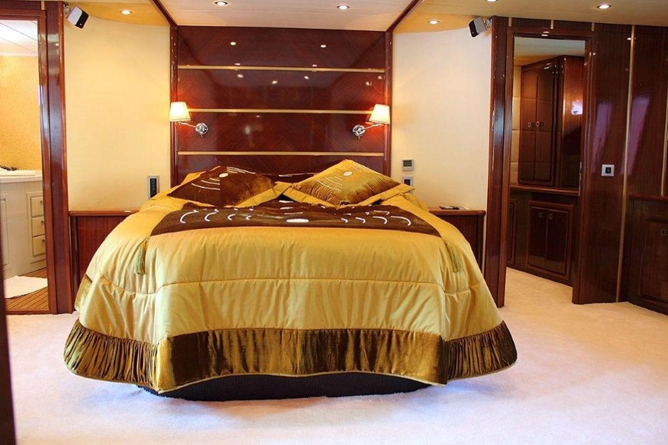 a bed in a room aboard DENIZ Yacht for Sale