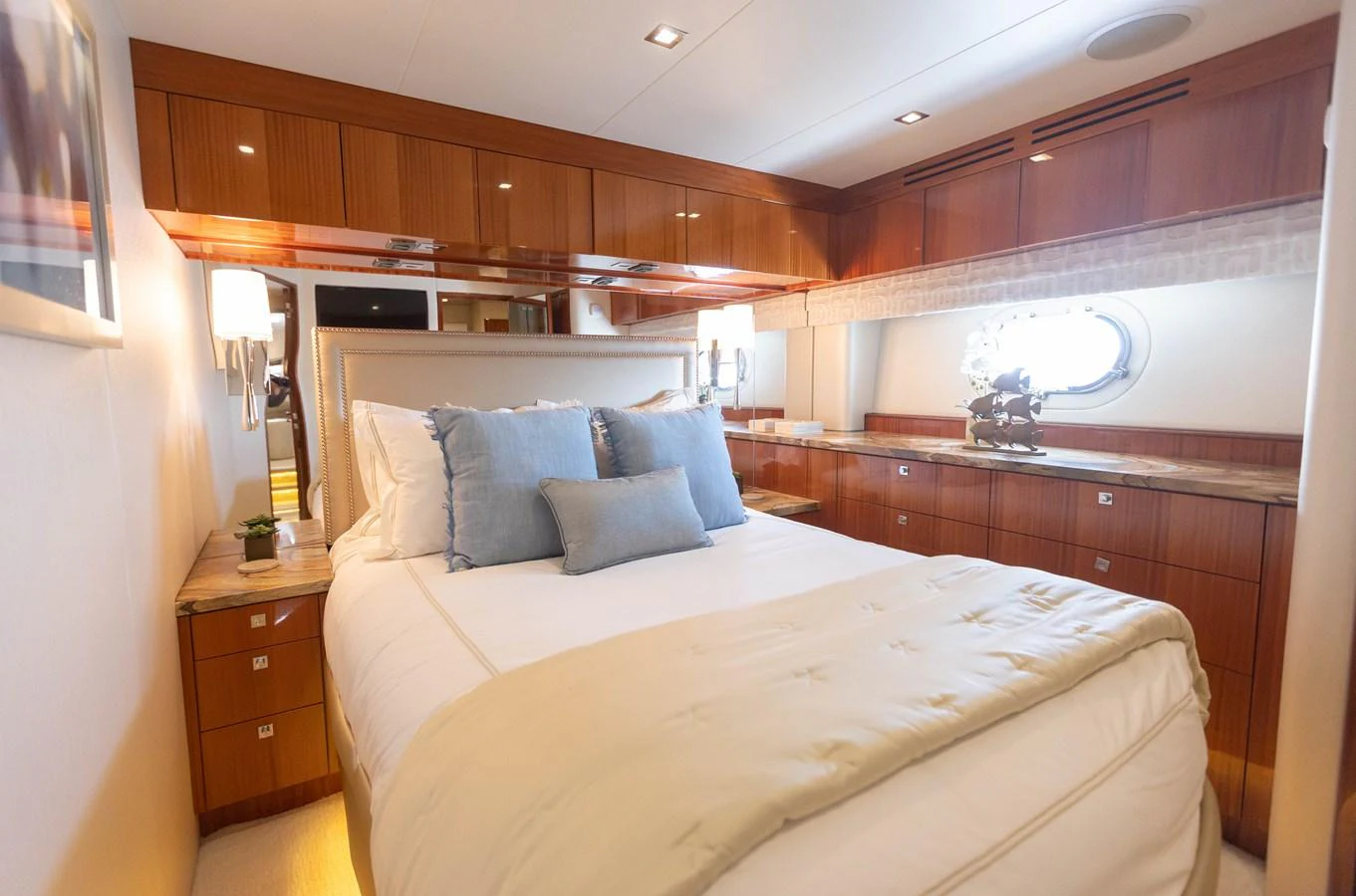 a bed in a room aboard CA'D'ZAN Yacht for Sale