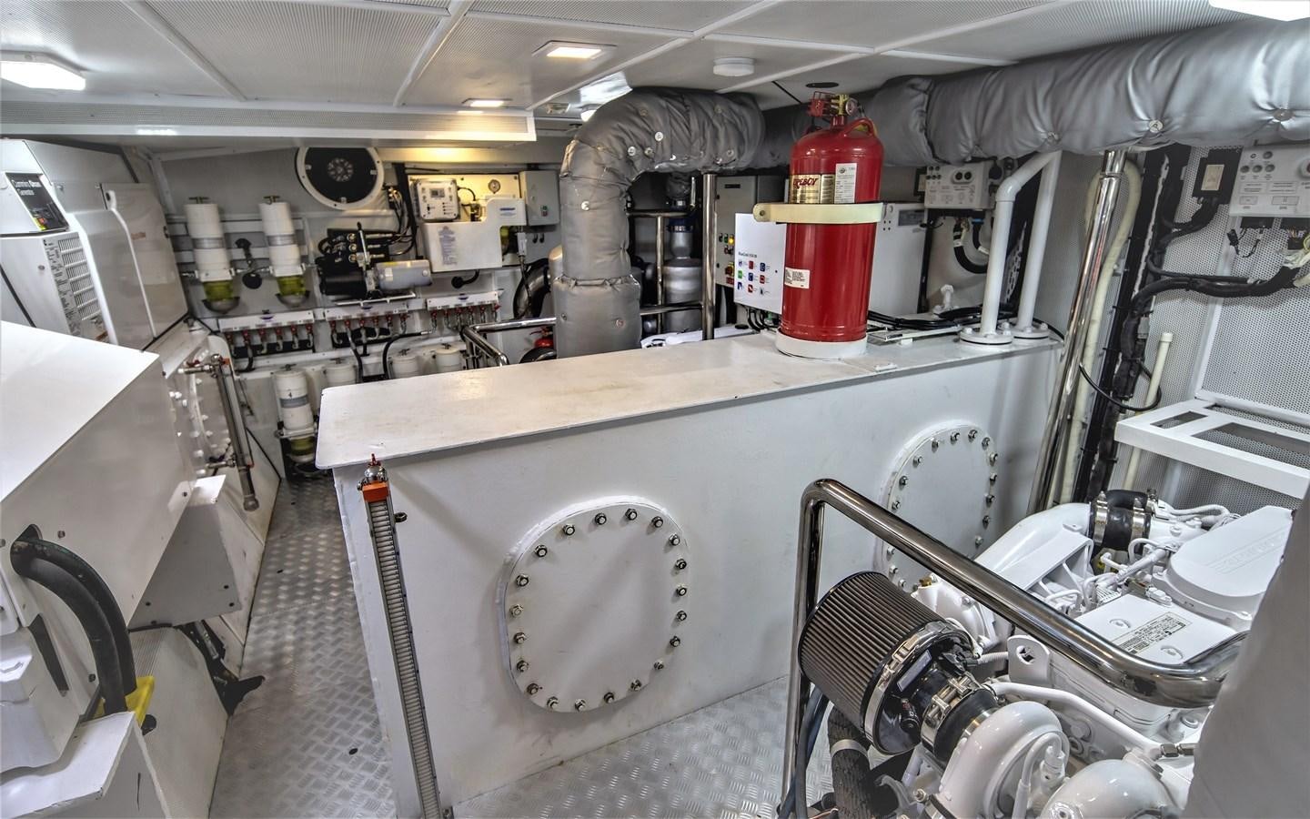 a large industrial machine aboard BERING 70 RA Yacht for Sale