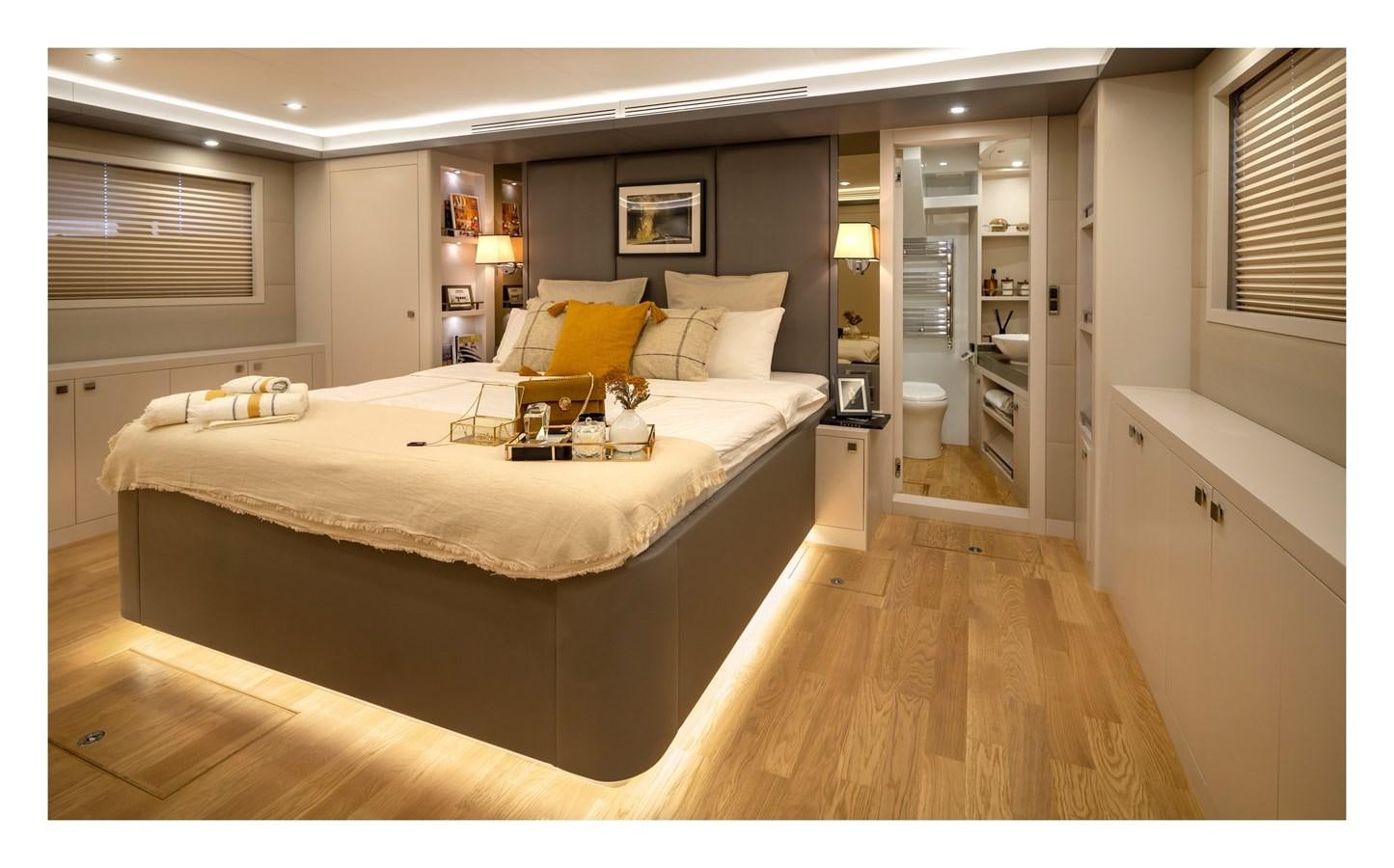 a large bedroom with a large bed aboard BERING 70 RA Yacht for Sale