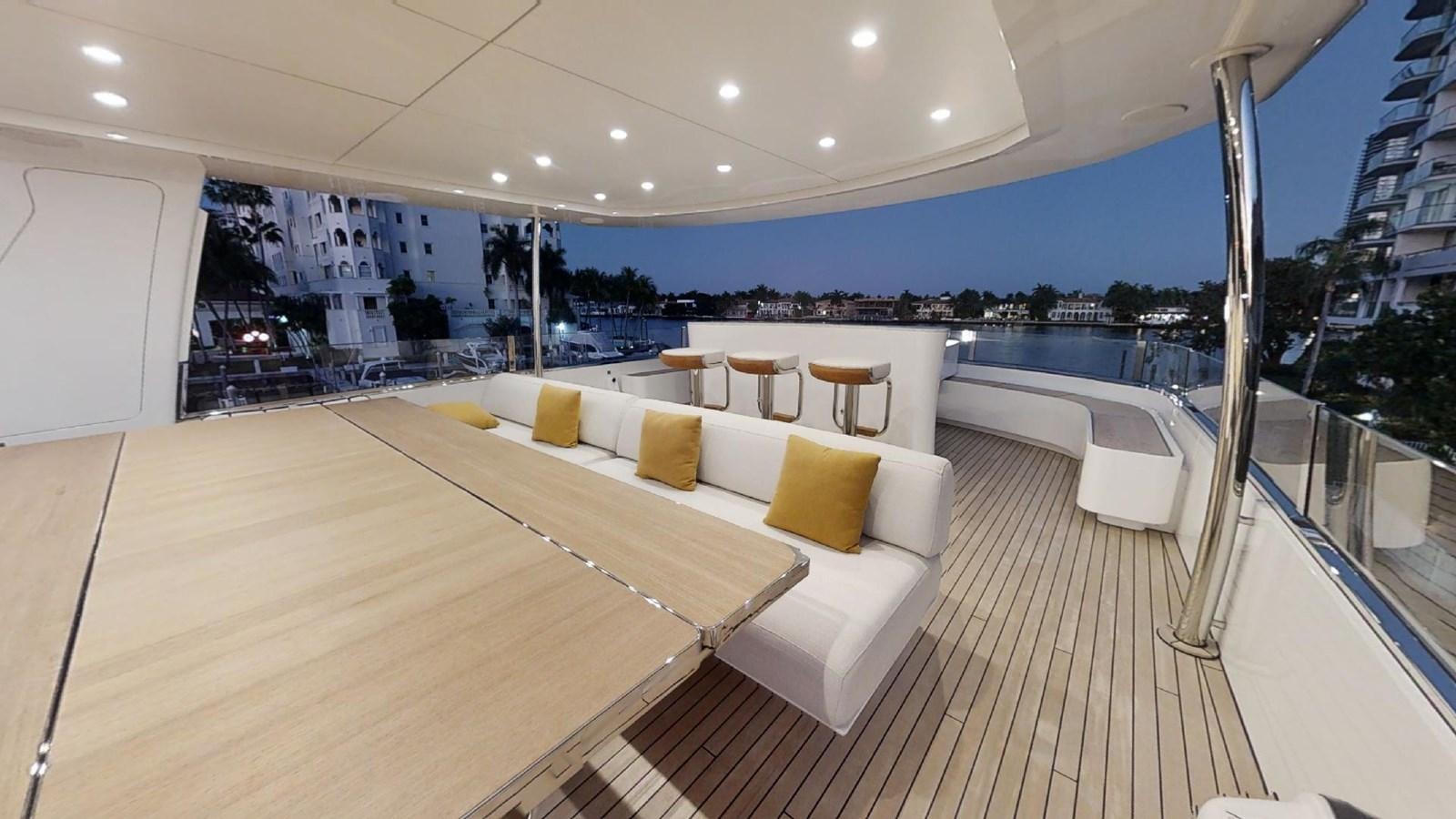 a room with a couch and a table and chairs aboard VOLO MARE Yacht for Sale