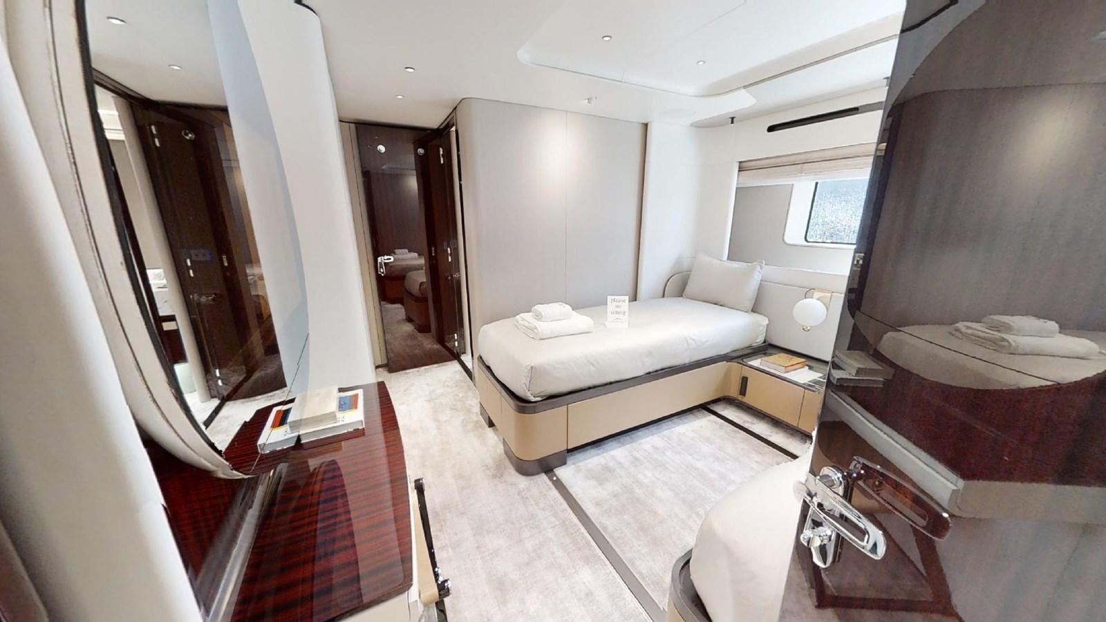 a room with a bed and a desk aboard VOLO MARE Yacht for Sale