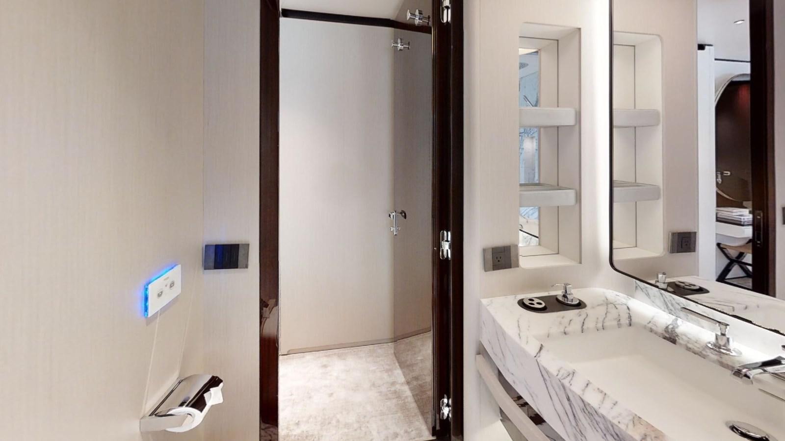 a bathroom with a sink and a mirror aboard VOLO MARE Yacht for Sale