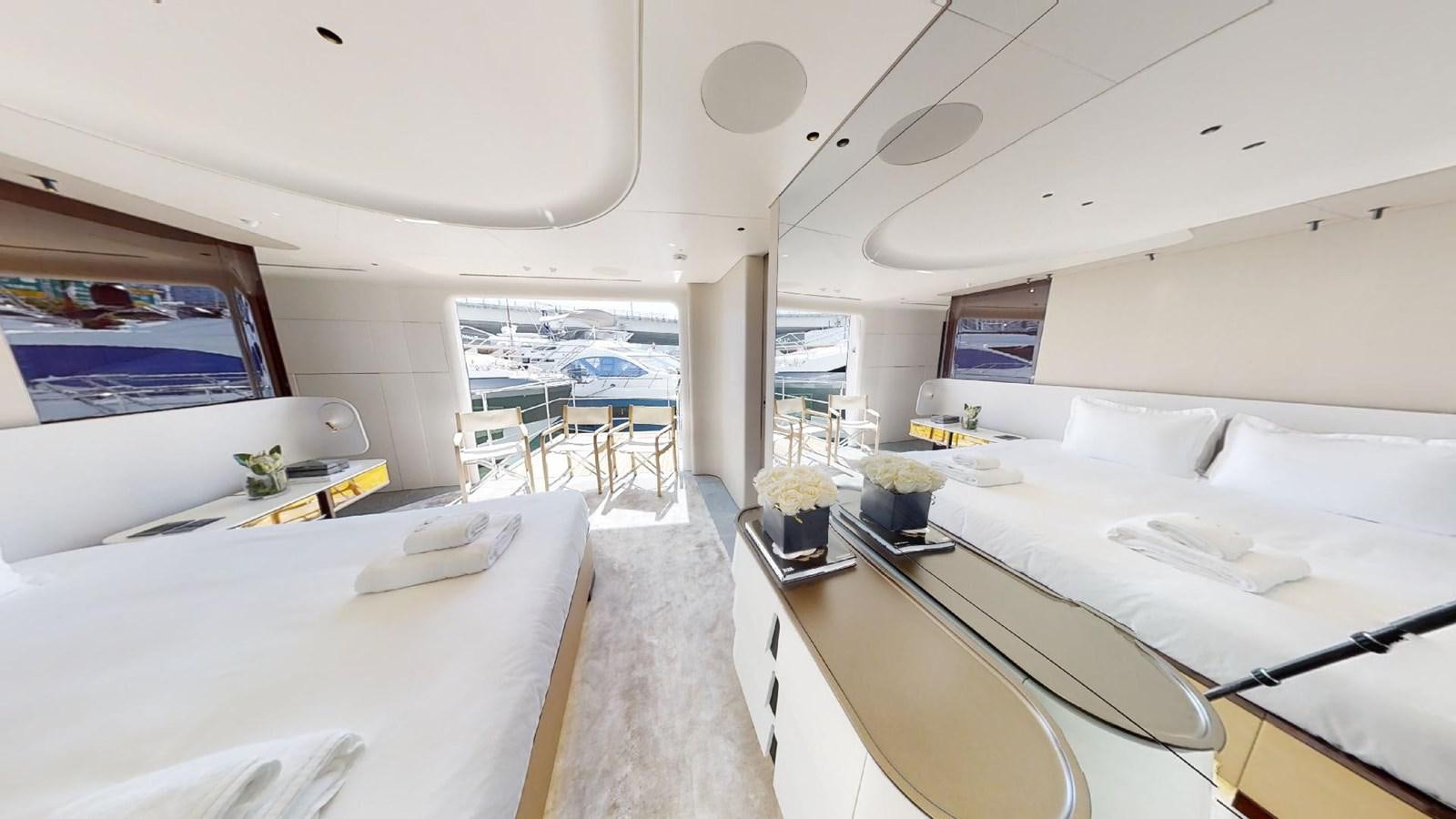 a room with a large window and a view of the ocean aboard VOLO MARE Yacht for Sale