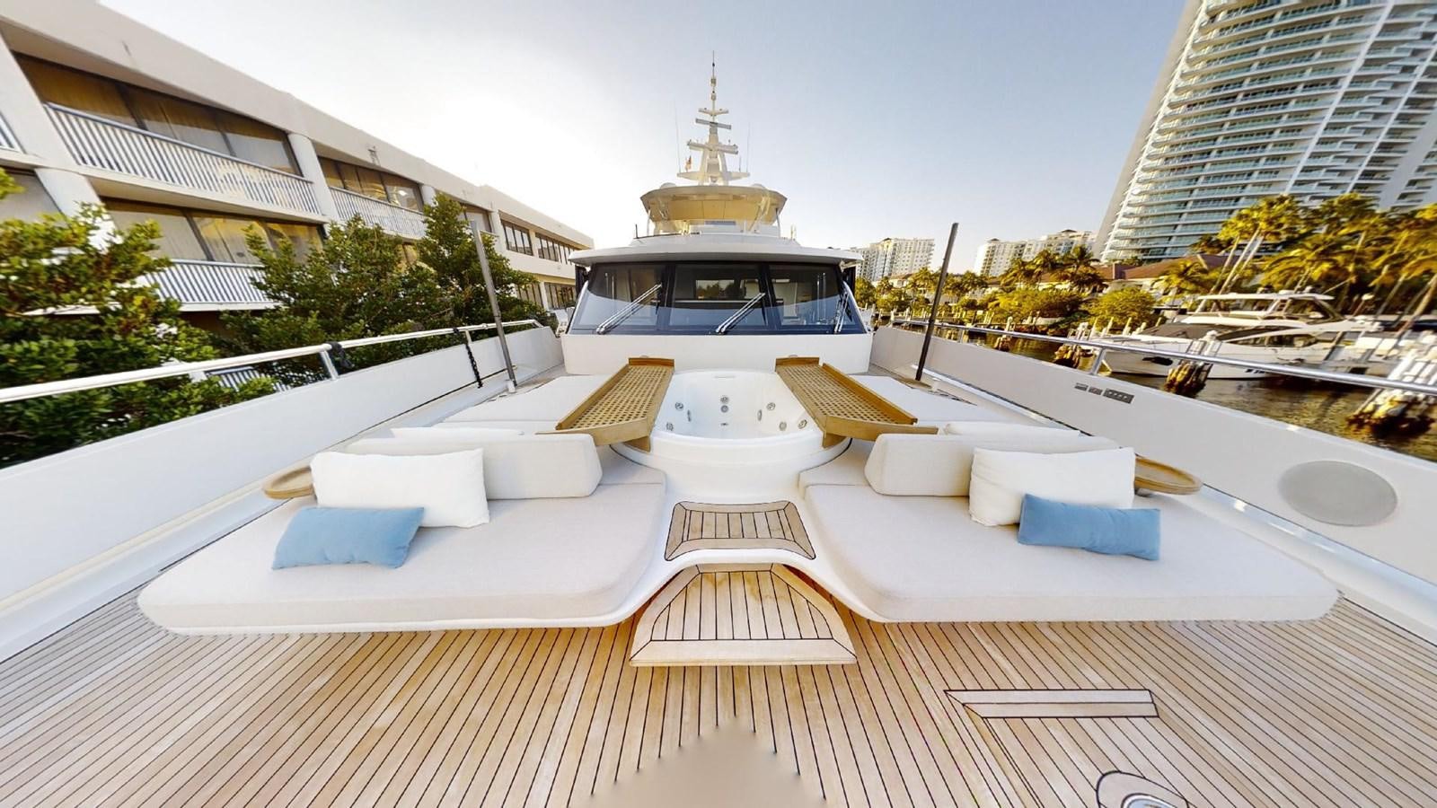 a white boat on a deck aboard VOLO MARE Yacht for Sale