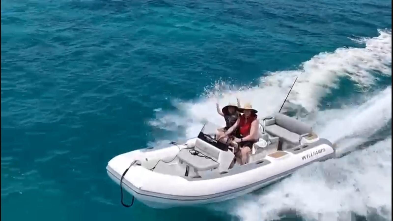 a person driving a boat aboard VOLO MARE Yacht for Sale