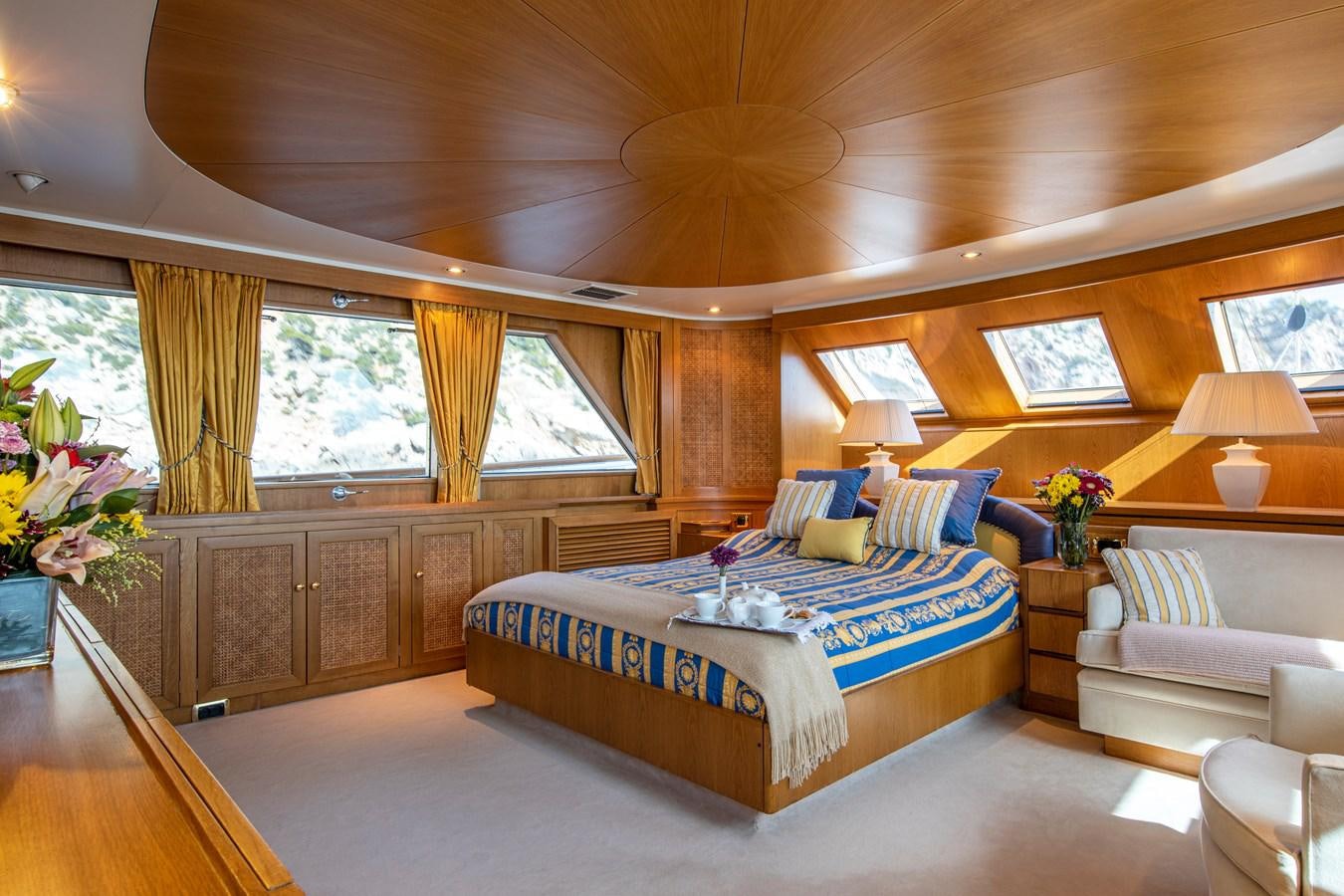 a bedroom with a large bed aboard MONACO Yacht for Charter