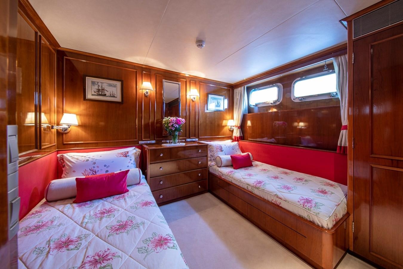 a couple of beds in a hotel room aboard MONACO Yacht for Charter
