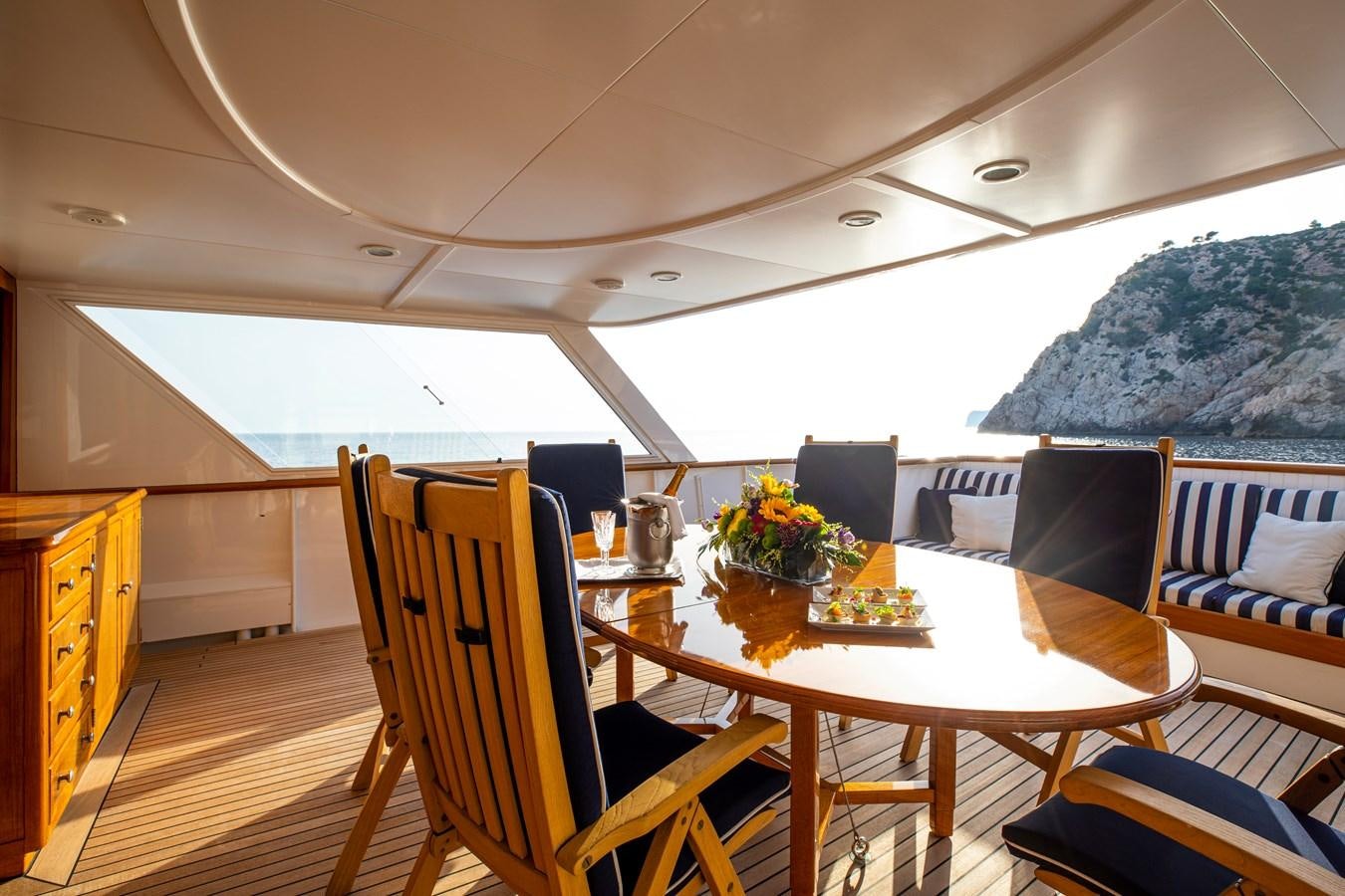 a dining table on a boat aboard MONACO Yacht for Charter