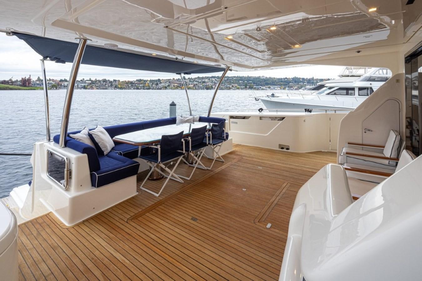 a large boat on a deck aboard SOL SHINE Yacht for Sale