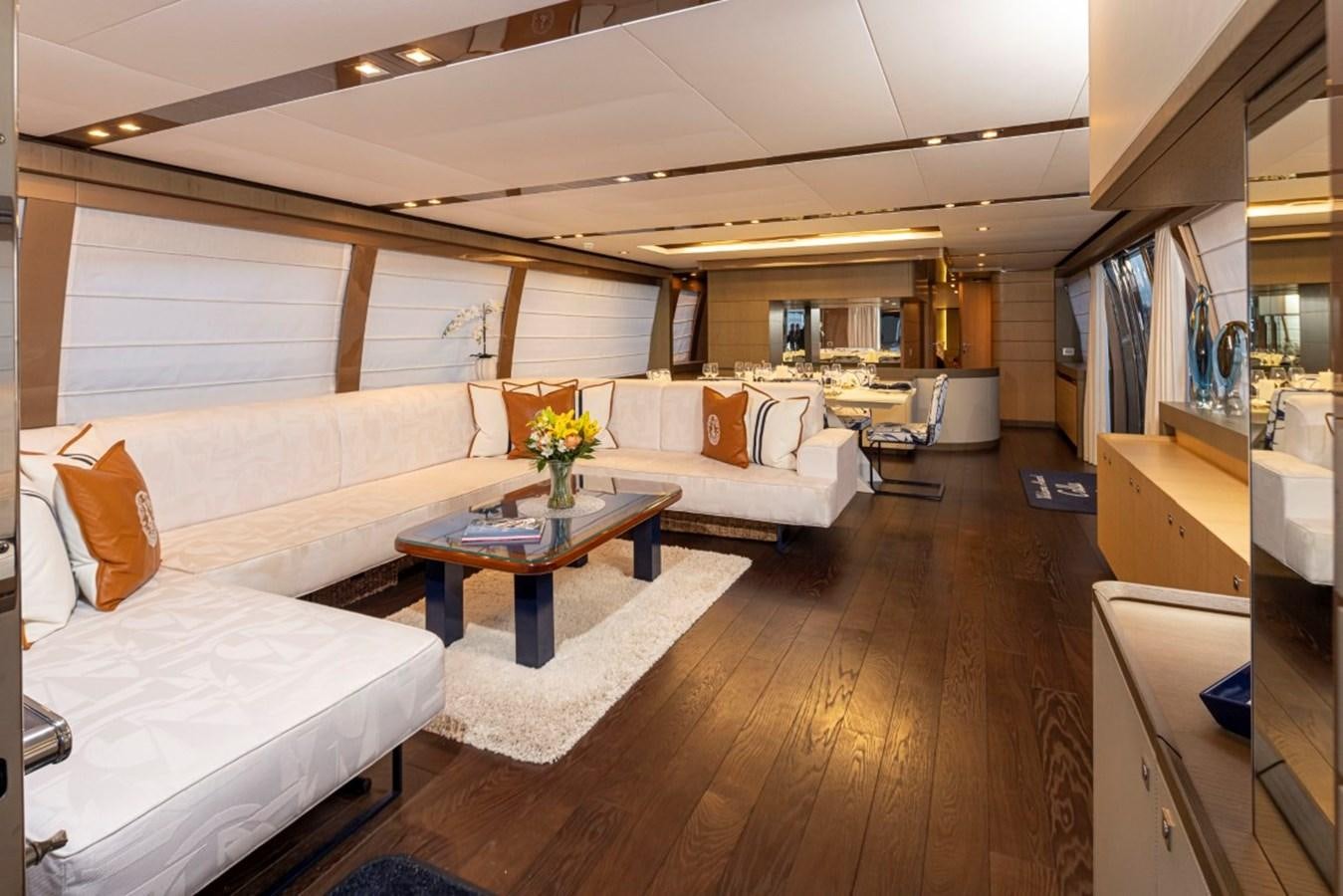 a room with a couch and a table aboard SOL SHINE Yacht for Sale