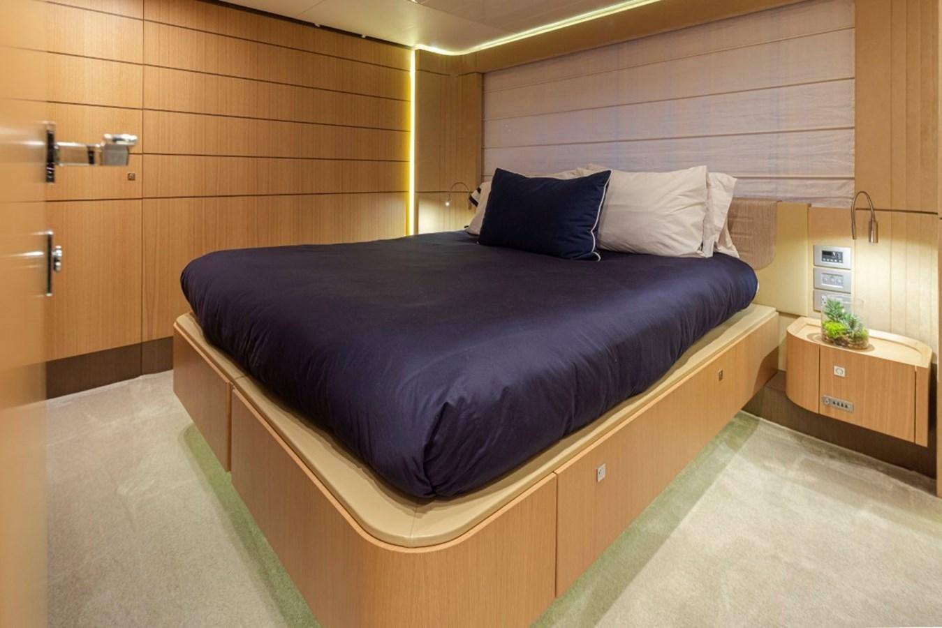 a bed in a room aboard SOL SHINE Yacht for Sale