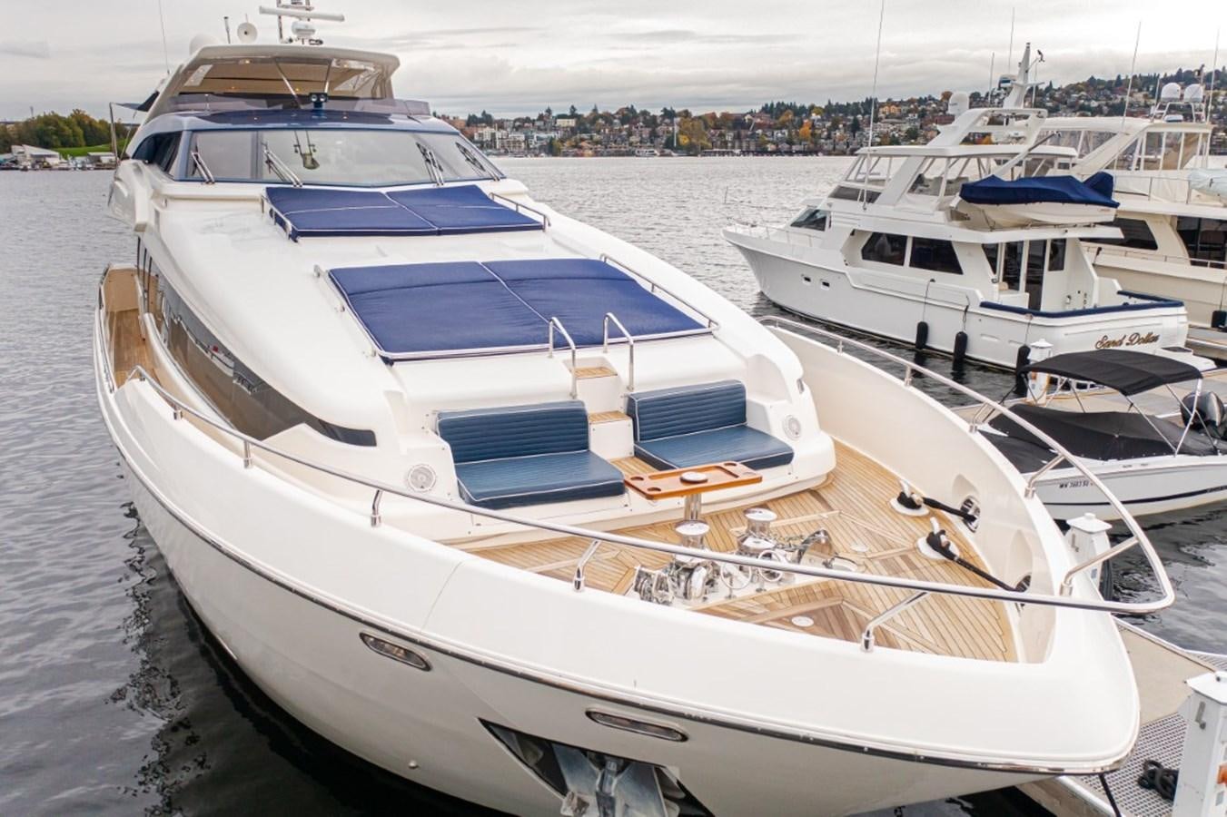 a boat docked in a harbor aboard SOL SHINE Yacht for Sale